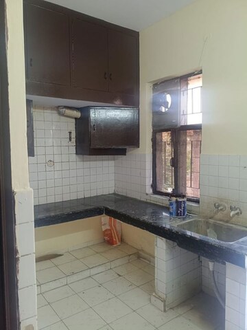 Kitchen in 2 BHK Apartment at RWA Apartments Sector 29, Sector 29 – for Rent