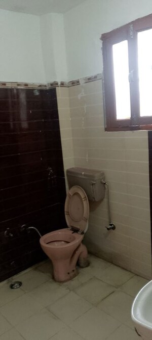 Bathroom in 2.5 BHK Builder Floor at Arun Yamuna Enclave, Sector 30 – for Rent