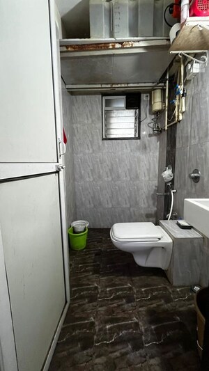 Bathroom in 1 BHK Apartment at Krishna Residency Atmaram Compound, Malad West – for Rent