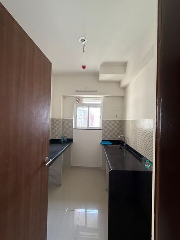 Kitchen in 1 BHK Apartment at Lodha Amara, Kolshet Road – for Rent
