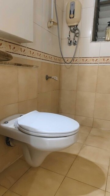 Bathroom in 2 BHK Apartment at Jasmine Tower, Vasant Vihar – for Sale