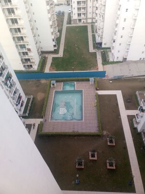 Kitchen in 2 BHK Apartment at Urban Axis Urban Woods, Sushant Golf City – for Rent