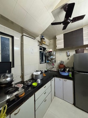 Kitchen in 2 BHK Apartment at Oberoi Realty Park View, Kandivali East – for Rent