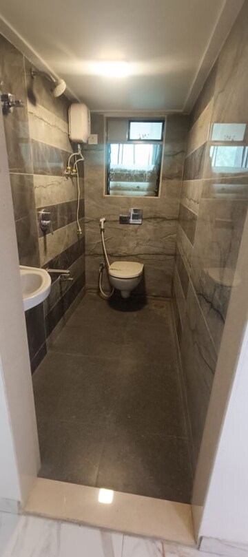 Bathroom in 2 BHK Apartment at RNA NG Bliss, Mira Road – for Sale