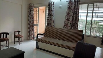 Living Room in 2 BHK Apartment at Sukhwani Pacific, Thergaon – for Rent