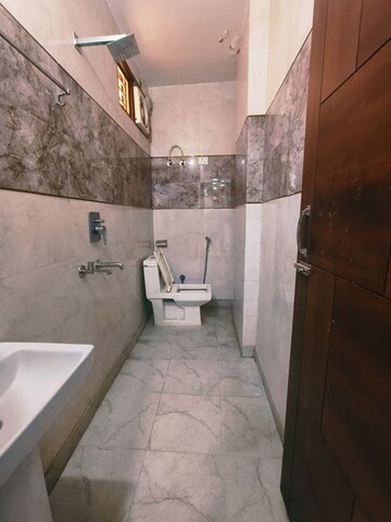 Bathroom in 2 BHK Builder Floor at Dwarka Mor – for Rent