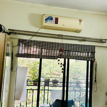 Bedroom in 2 BHK Apartment at Kumar Periwinkle, Kharadi – for Rent