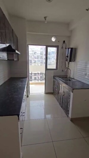 Kitchen in 2 BHK Apartment at Gulshan Bellina, Sector 16 Greater Noida – for Sale