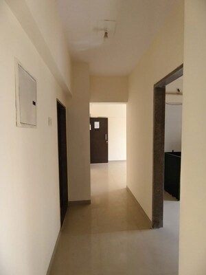 Building Lobby in 2 BHK Apartment at Lalani Grandeur, Goregaon East – for Rent
