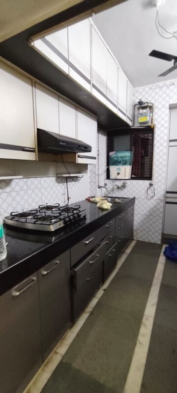 Kitchen in 2 BHK Apartment at Rutu Park Majiwada, Thane West – for Rent