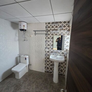 Bathroom in 4 BHK Apartment at Divyansh Orion Homes, Mahurali – for Rent