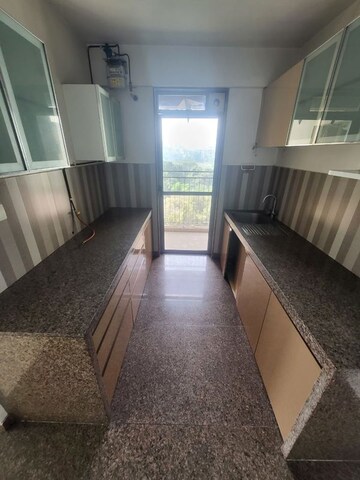 Kitchen in 2 BHK Apartment at Dosti West County Phase 4 Dosti Pine, Balkum Pada – for Rent