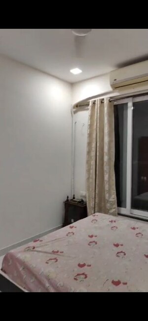Master Bedroom in 2 BHK Apartment at Triumph Swastik, Malad West – for Rent