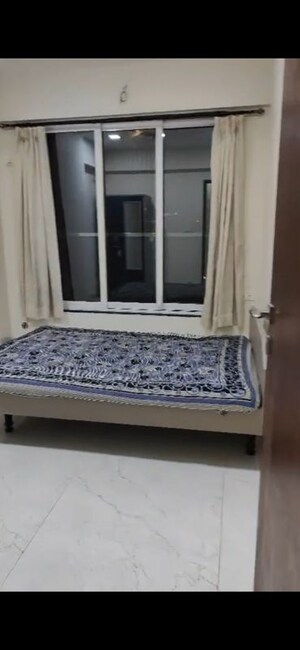 Bedroom in 2 BHK Apartment at Triumph Swastik, Malad West – for Rent