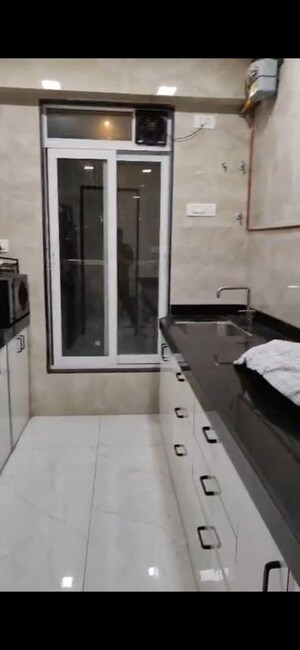 Kitchen in 2 BHK Apartment at Triumph Swastik, Malad West – for Rent