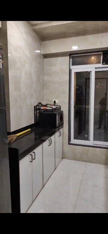 Kitchen in 2 BHK Apartment at Triumph Swastik, Malad West – for Rent