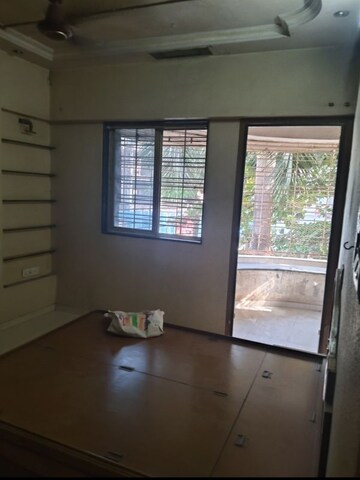 Room in 2 BHK Apartment at Pooja CHS Borivali, Borivali West – for Sale