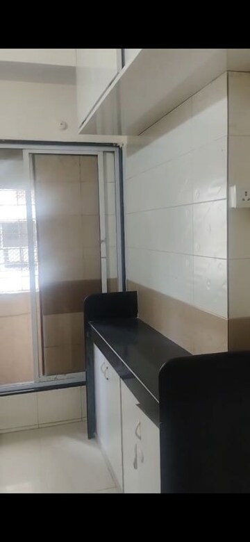 Kitchen in 2 BHK Apartment at Atul Blue Excellency, Goregaon West – for Rent