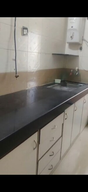 Kitchen in 2 BHK Apartment at Atul Blue Excellency, Goregaon West – for Rent