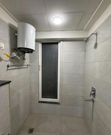 Bathroom in 3 BHK Apartment at Godrej Woods, Sector 43 – for Rent