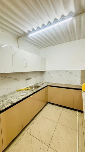 Kitchen in 3 BHK Builder Floor at Dhakoli – for Sale