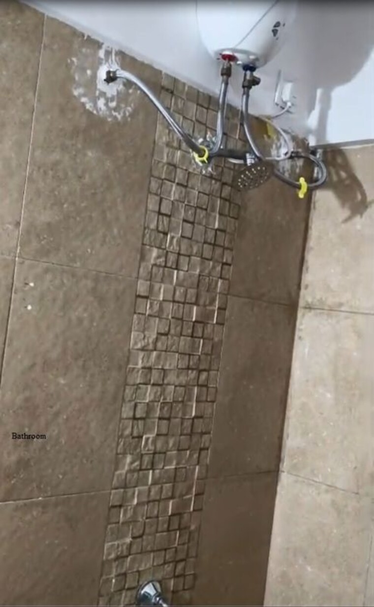 Bathroom, kolte-patil-umang-premiere 1 Bedroom 670 Sq.Ft. Apartment In Wagholi Pune 9812908