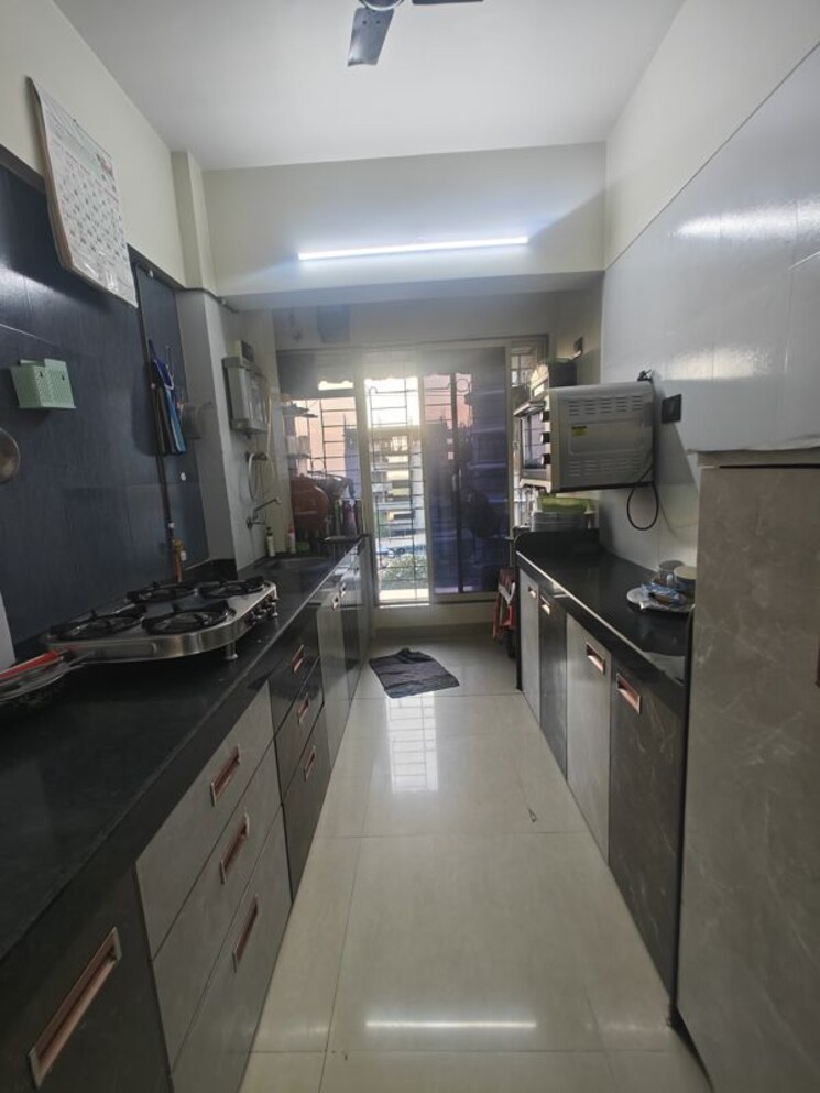 Kitchen, innovative-r-k-residency 2 Bedroom 1010 Sq.Ft. Apartment In Nerul Navi Mumbai 9812936