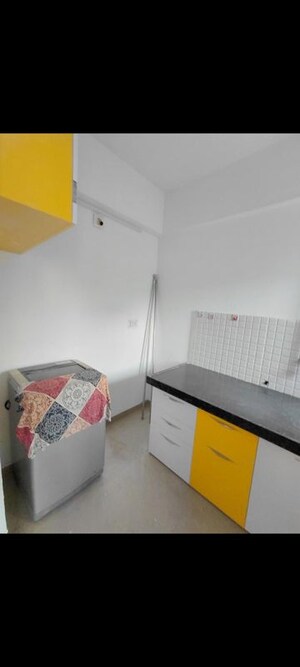 Team Area in 1 BHK Apartment at Applewood Satyesh Residency, Shela – for Rent