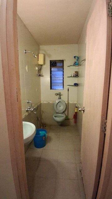 Bathroom in 1 BHK Apartment at Shah Arcade II, Malad East – for Rent