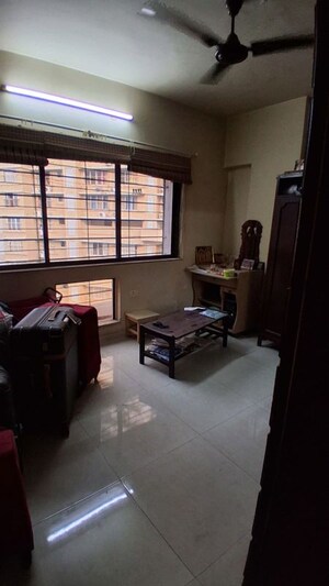Living Room in 1 BHK Apartment at Shah Arcade II, Malad East – for Rent