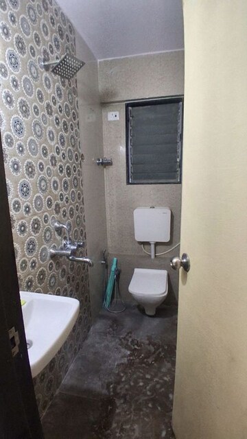 Bathroom in 1 BHK Apartment at LK Shri Anand CHS, Malad East – for Rent