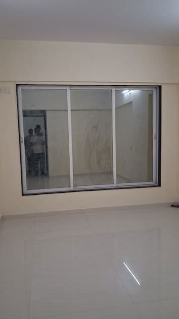 Room in 1 BHK Apartment at LK Shri Anand CHS, Malad East – for Rent