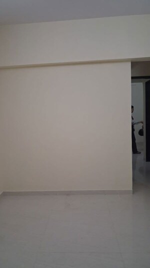 Room in 1 BHK Apartment at LK Shri Anand CHS, Malad East – for Rent