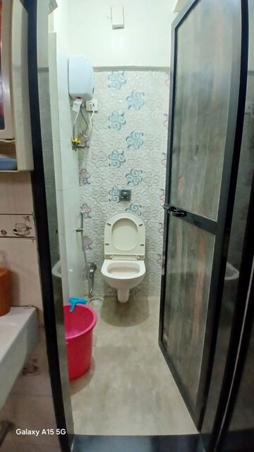 Bathroom in 1 BHK Apartment at Gardenia CHS, Kandivali East – for Rent