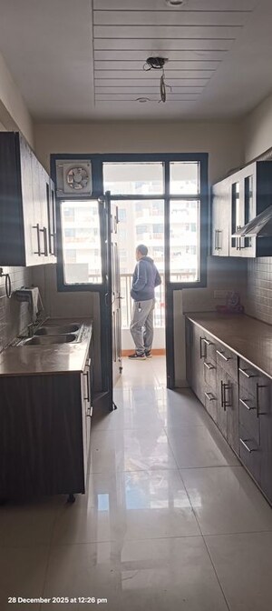 Kitchen in 3 BHK Apartment at Golden Sand Apartments, Dhakoli – for Sale