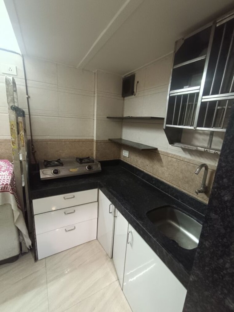 Kitchen, bindra-complex 1 RK 225 Sq.Ft. Apartment In Andheri East Mumbai 9813096