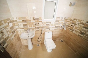 Bathroom in 3 BHK Apartment at Presithum, Sector 25 Yamuna Expressway – for Rent