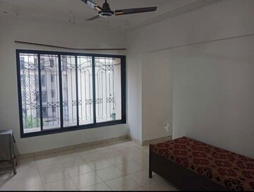 Bedroom in 2 BHK Apartment at Sheth Vasant Lawns, Laxmi Nagar – for Rent