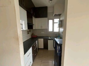 Kitchen in 1 BHK Apartment at Gaur Atulyam, Omicron I Greater Noida – for Sale