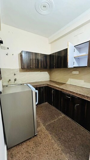 Kitchen in 1.5 BHK Builder Floor at Ansal Plaza Sector-23, Sector 23 – for Rent