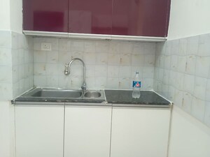 Kitchen in 3.5 BHK Apartment at Gaur Sportswood, Sector 79 – for Rent