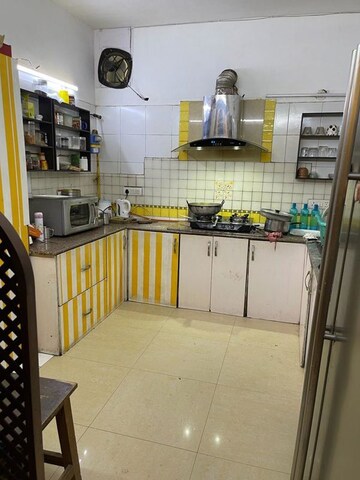 Kitchen in 3 BHK Apartment at Trikuta Apartments, Sector 29 – for Rent