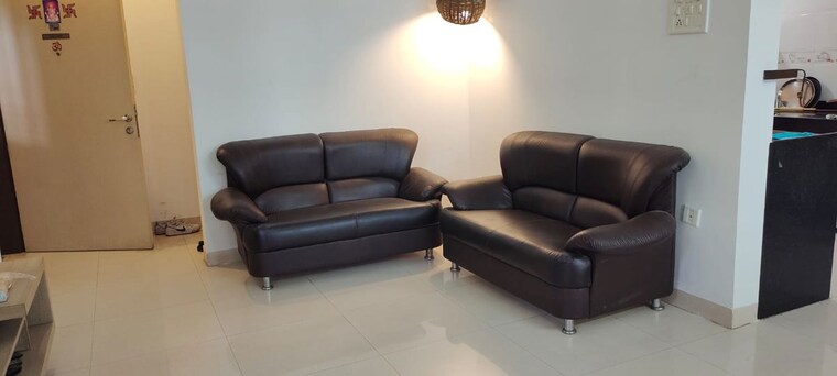 Living Room, magarpatta-sylvania 2 Bedroom 1200 Sq.Ft. Apartment In Hadapsar Pune 9813562