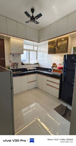 Kitchen in 2 BHK Apartment at Venkatesh Viraj Heights, Dhanori – for Rent