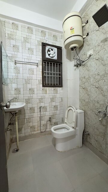 Bathroom in 2 BHK Builder Floor at Chattarpur – for Rent