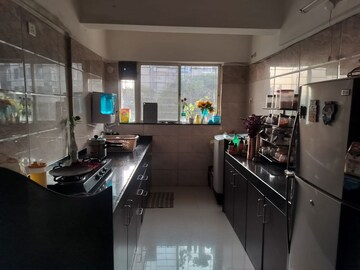 Kitchen in 2 BHK Apartment at GK Dwarka Flora Residency, Pimple Saudagar – for Rent