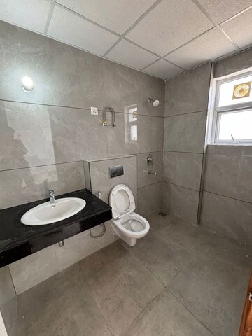 Bathroom in 3 BHK Apartment at Omaxe Lake, North Mullanpur – for Rent