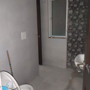 Bathroom in 3 BHK Apartment at JM Aroma, Sector 75 – for Rent