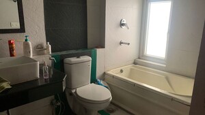 Bathroom in 3 BHK Apartment at Oxirich Avenue, Ahinsa Khand 2 – for Rent