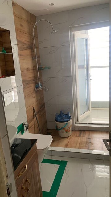 Bathroom in 3 BHK Apartment at Oxirich Avenue, Ahinsa Khand 2 – for Rent